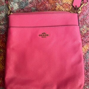 Hot pink coach crossover bag